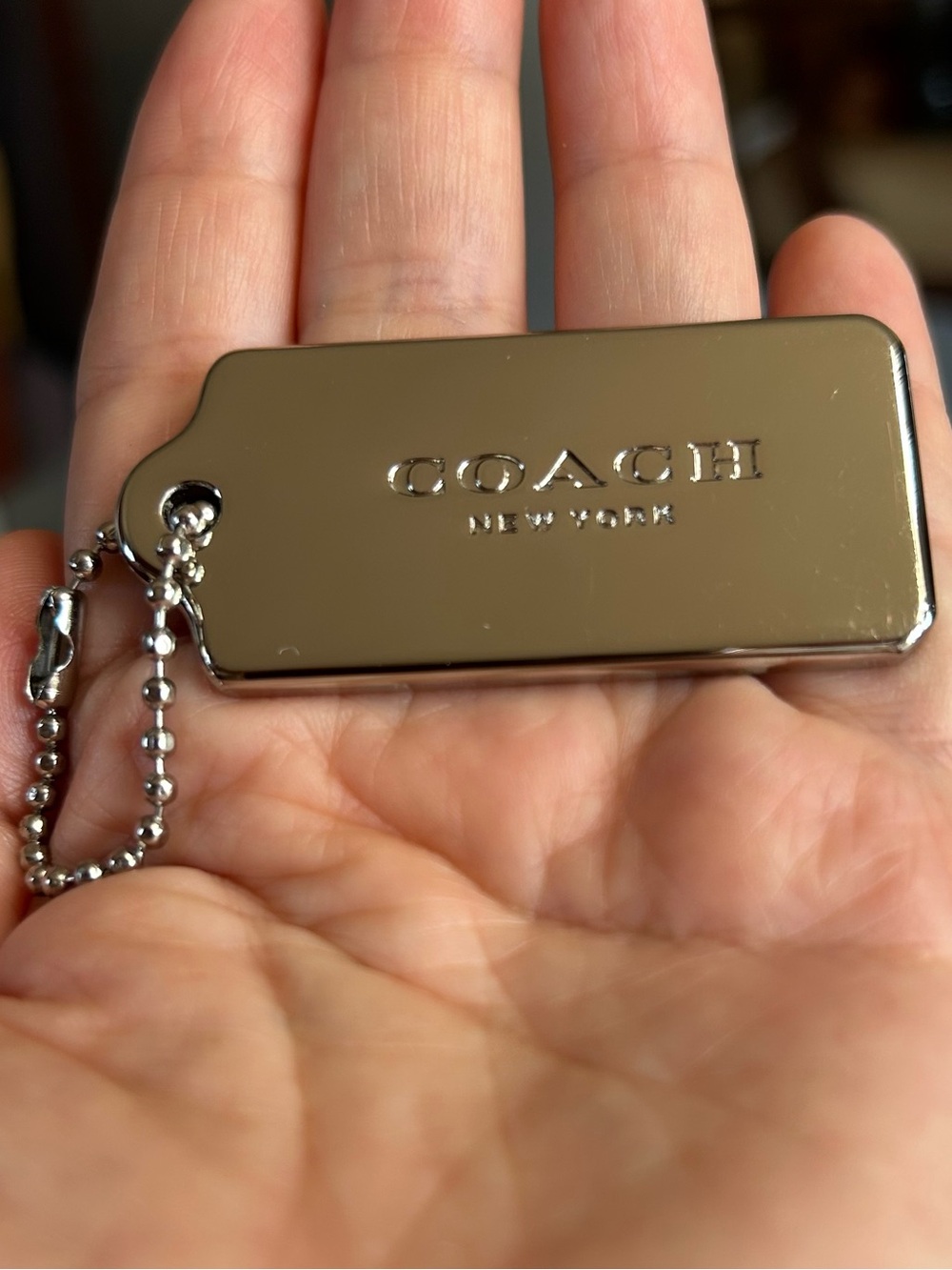 Coach New York silver-tone metal hangtag bag charm